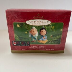 Hallmark Ornament Peanuts Pageant Porcelain 2001. Two ornaments, new in box.